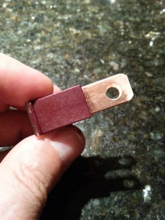 Dealer purchased fuse has solid bladed  contacts...