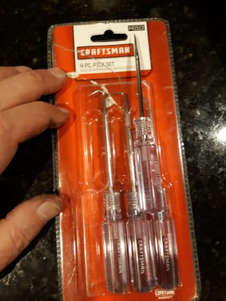 Craftsman tools used to open plastic lances for removal.of contacts.