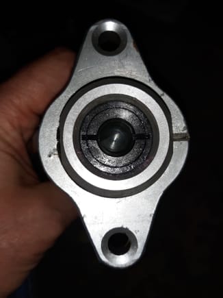 This end depicts piston installed  in bore .notice the slots align.. The innermost cylinder slot is indexed 90 degrees.