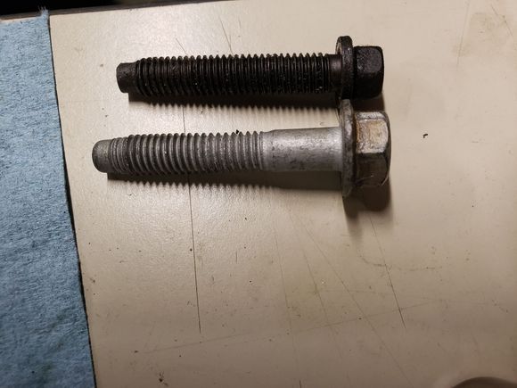 Top bolt from 2j cam cap, bottom is gm oe oil pump bolt. The oil lump bolts yielded while retorquing so I used some 2J bolts laying around to make it work.