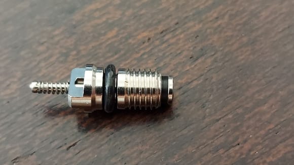 The easiest way for me tell them apart from other valves is the number of threads on the screw part.  They have 6 or 7 threads with black o-rings.  