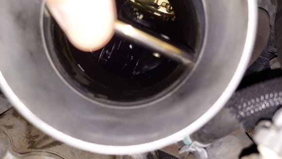 Intake plenum.  Oil in the bottom.