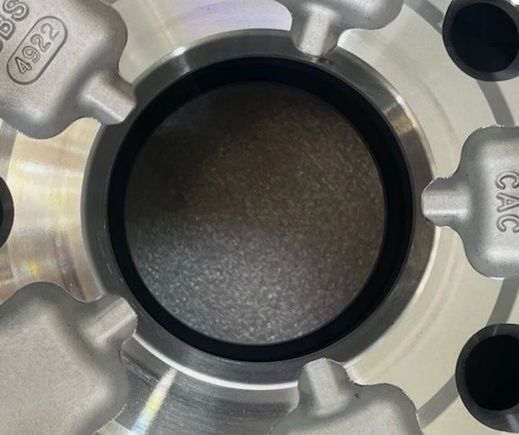 Back of BBS wheel (pic from ebay). I can see a 45 degree chamfer edge that wouldn't make contact with the hub after an 8mm spacer. Can't tell how deep it goes but according to OP is 5.2mm?
