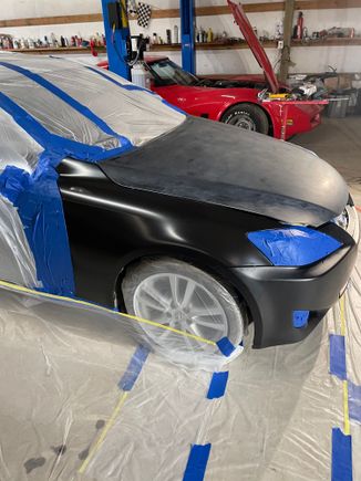Taped, peeped with 600 grit for hood and a plastic adhesion coat on bumper with flex agent to avoid cracking.