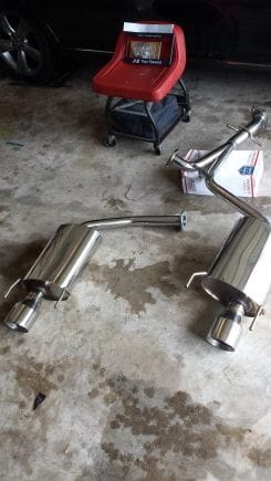 Tanabe axle back exhaust with custom Mid pipe.