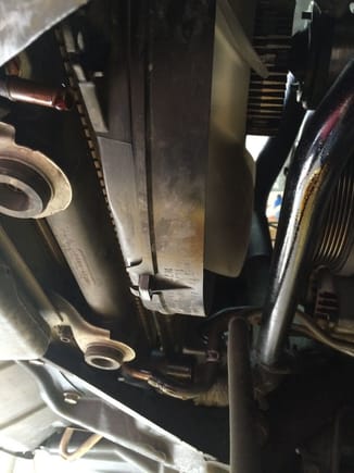 This is what you're looking at when removing the lower rad hose connection, trans cooler hoses, and disconnecting the radiator fan coolant temp sensor.