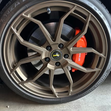 Decided to paint the calipers a metallic orange courtesy of Lamborghini. Neochromatic decal came out great too. Changes colors depending on the angle and light. Going to have custom centercaps to match better. Looks great against caviar and made me love my wheels even more. 