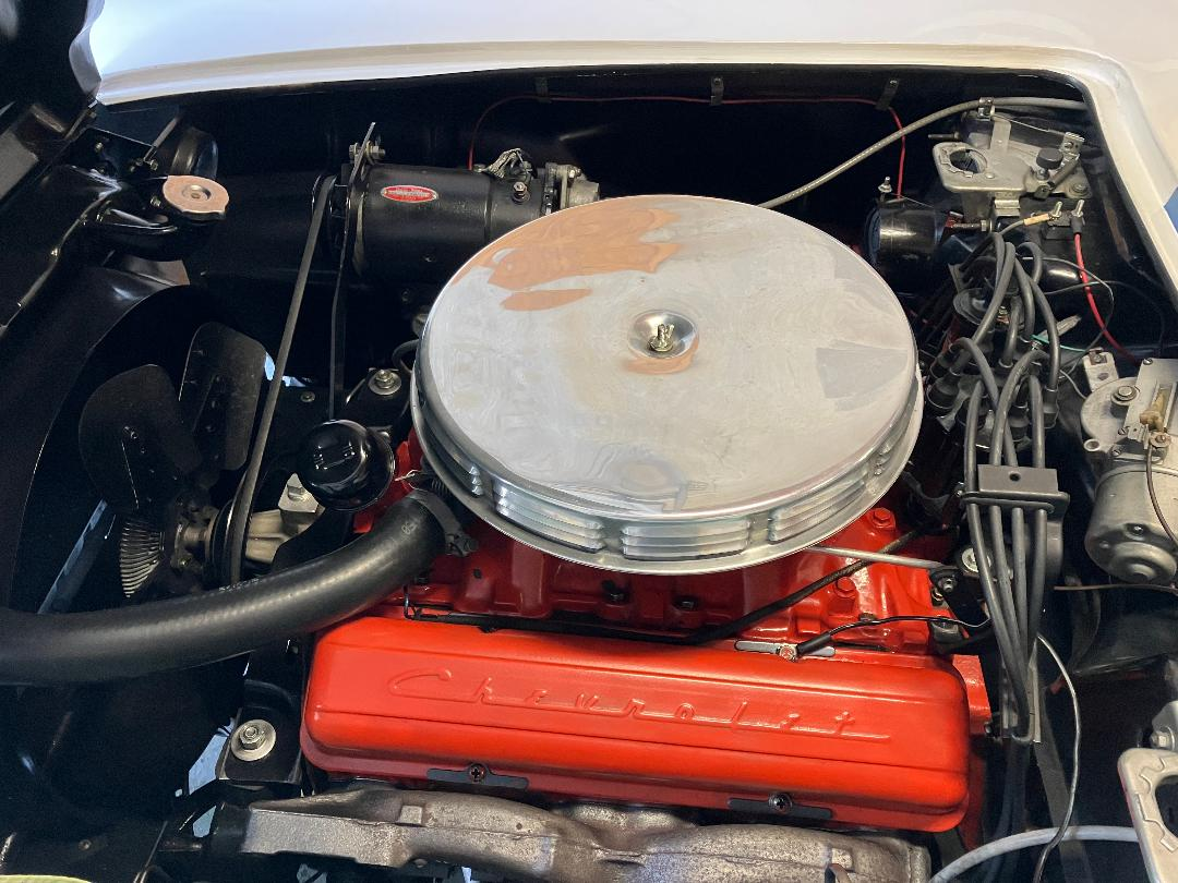 This is the initial set-up of my 1960 Corvette, 230 hp, single wcfb carburetor and the orange Chevrolet valve covers