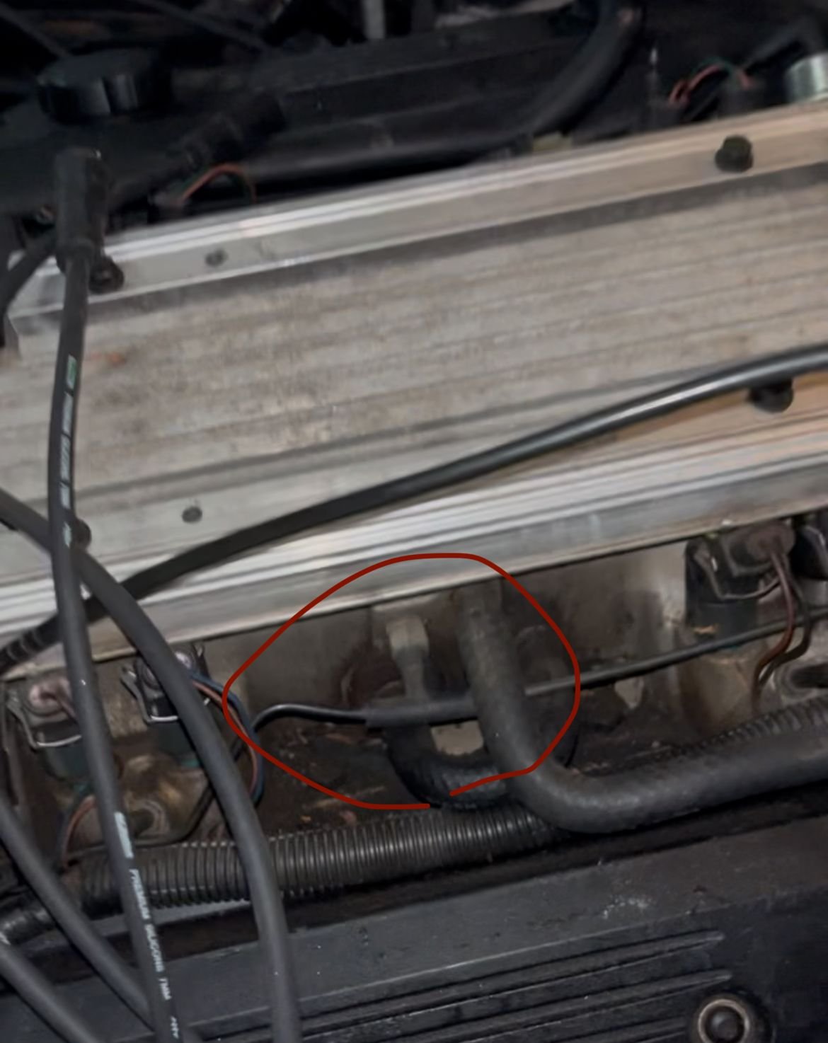 is anyone able to tell me what this line is? It had snapped underneath the ASR module and needs replacing but I�m unable to identify what part this is. this is on my 1992 LT1.