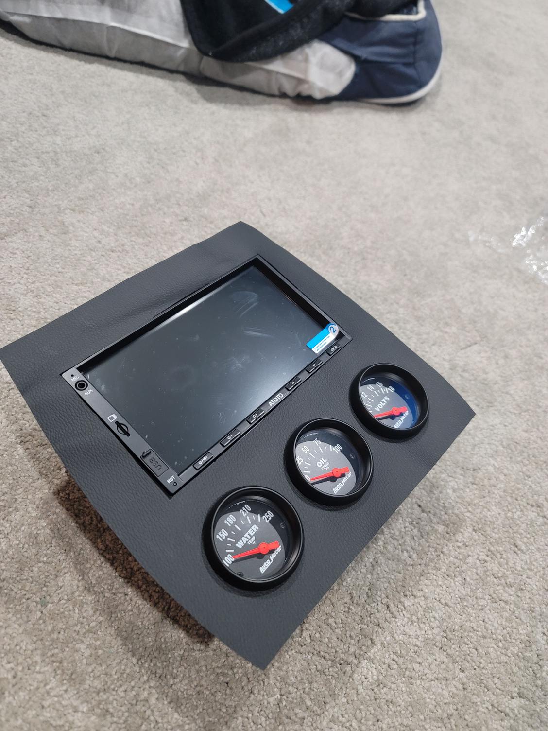 Faux leather just laid over the faceplate