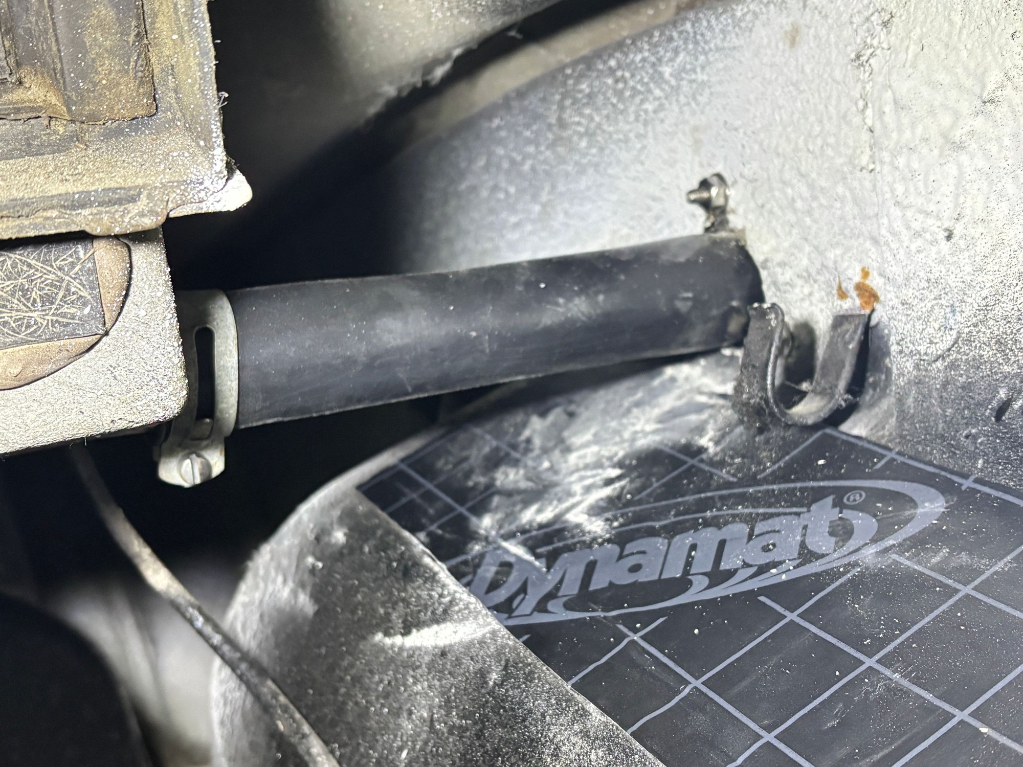 Excuse the dust, I had to scrape some dried Lizardskin out of the hole that the drain tube passes through.