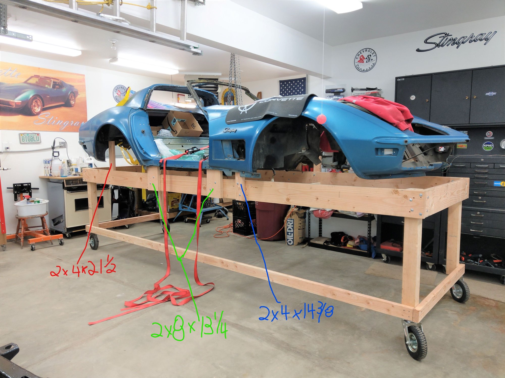 Upright placed under each body mount. Support for the nose was added later