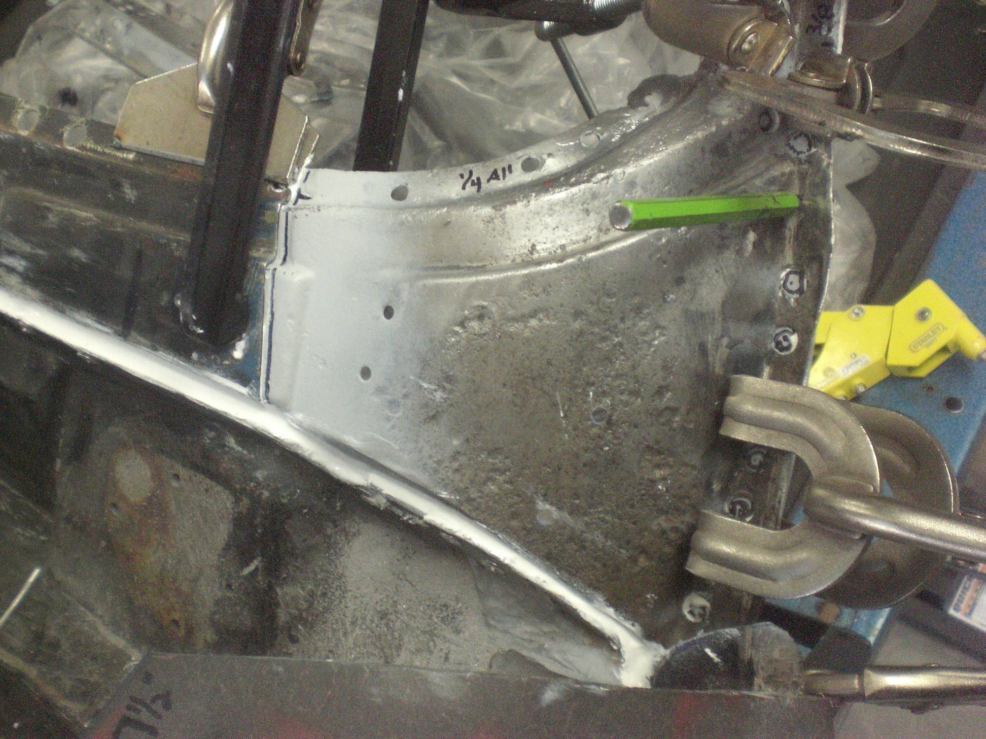 Green punch through outer corner locating hole into hinge pillar ensured proper placement.