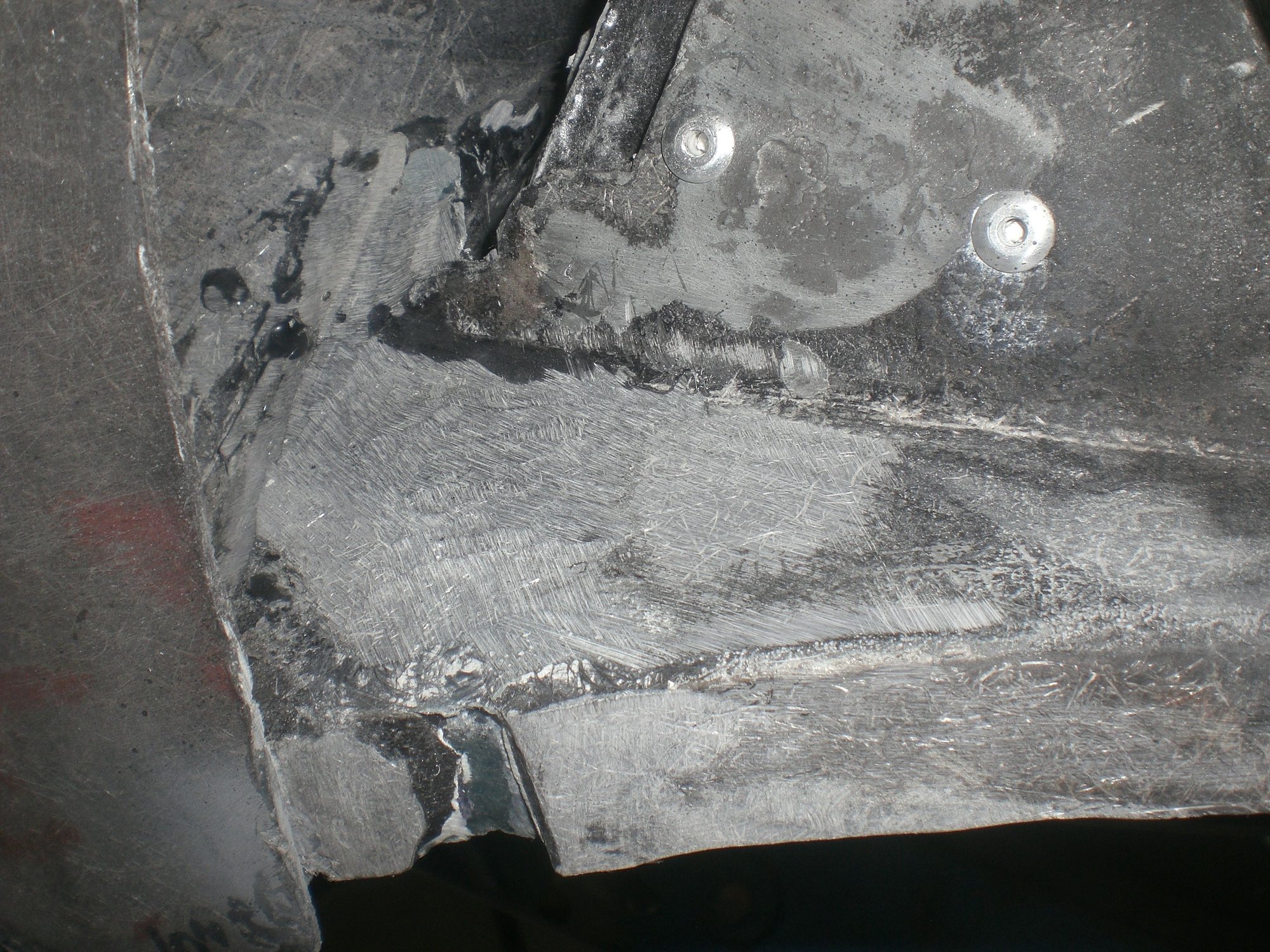 VPA sealed the gap nicely and sanded down well considering it wont be seen.  The gap in the bonding flange at the bottom of the photo was filled with VPA later.