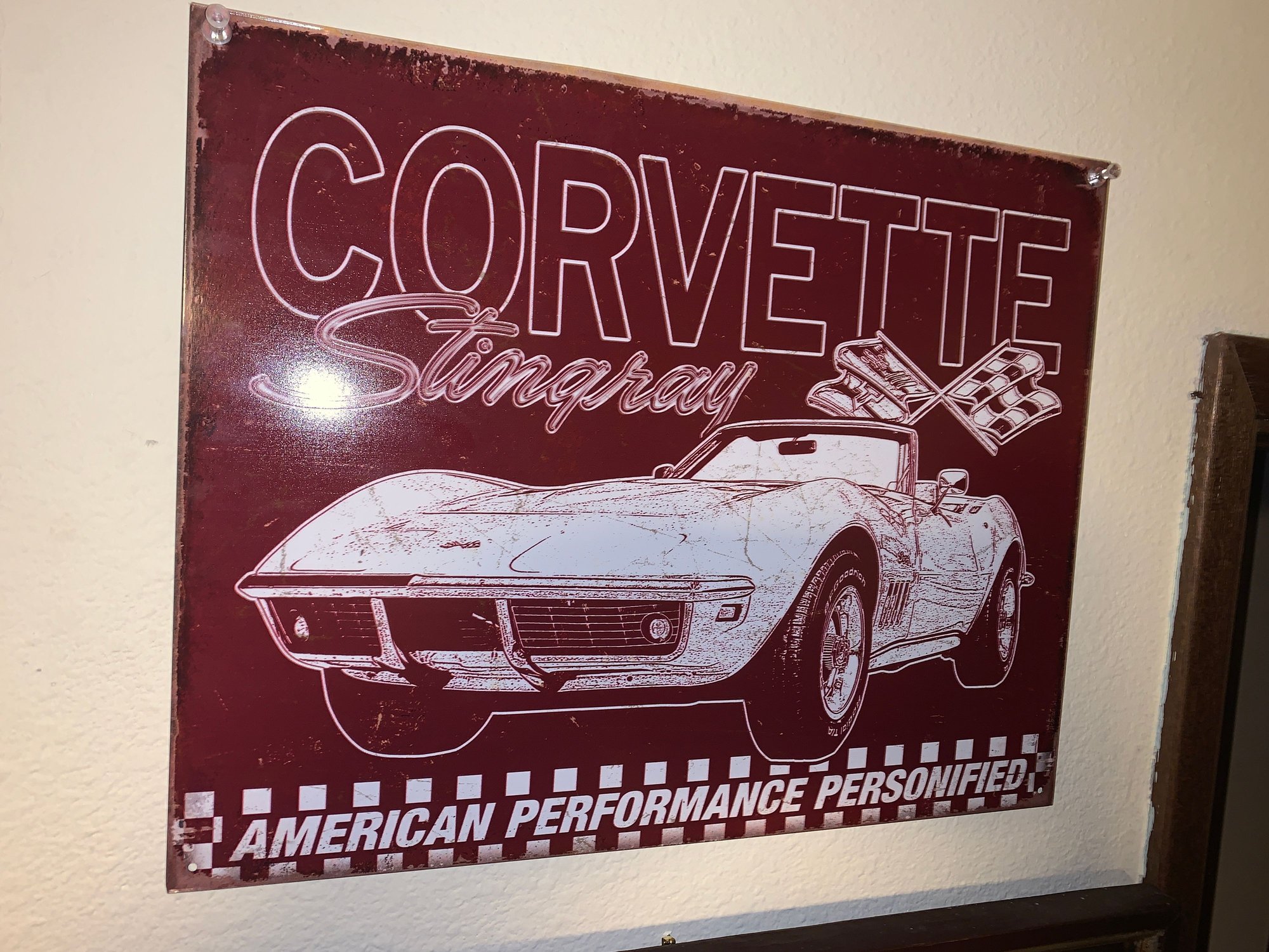 Just a cheap metal sign but it had a GM authorization hologram on the back.