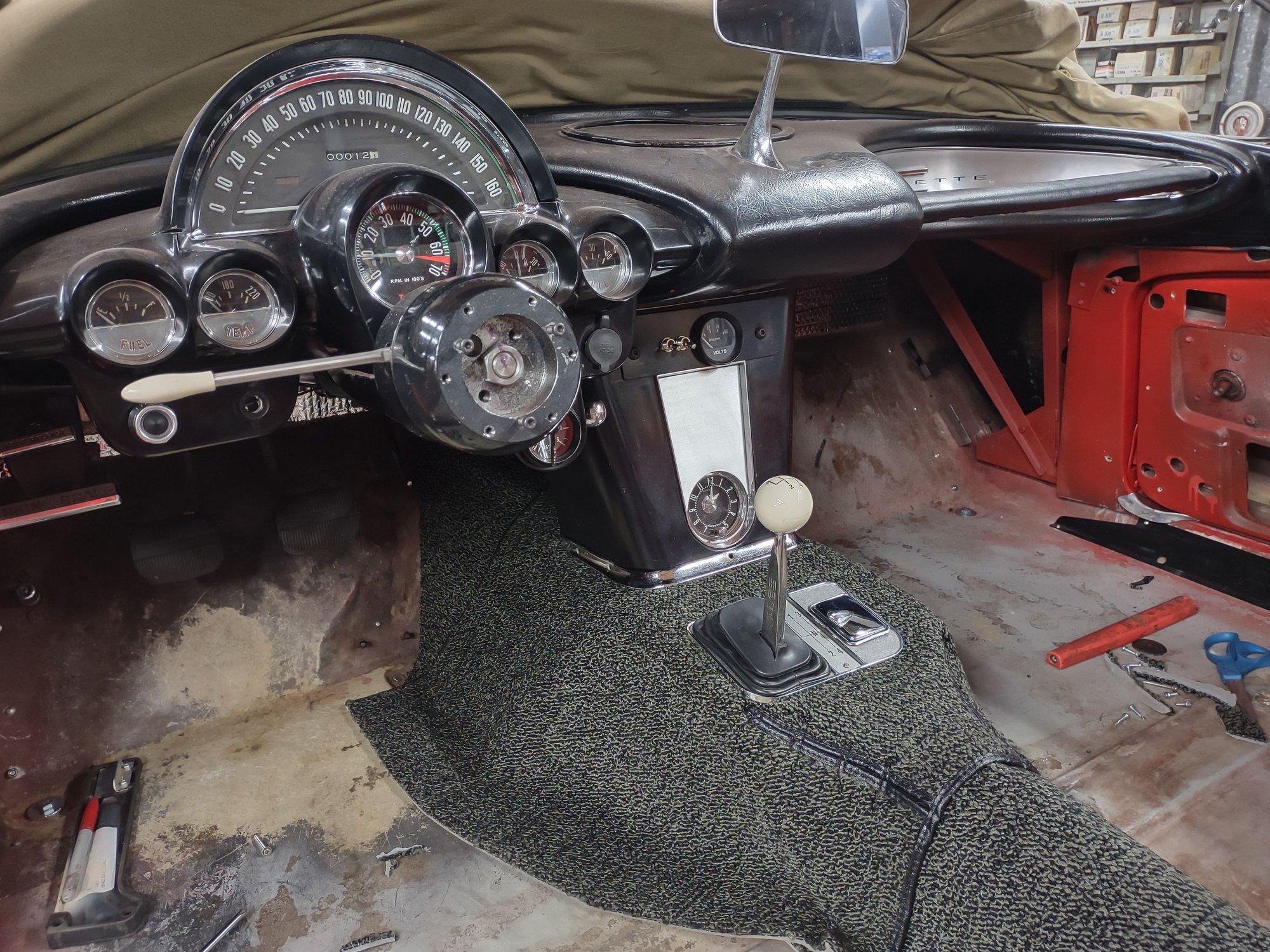 This shows my modification to their turn lever. It looked like the hazard switch, I machined it down in the lathe and painted it ivory. it looks pretty stock. The later turn signal switch is a dream come true and it cancels very nicely.