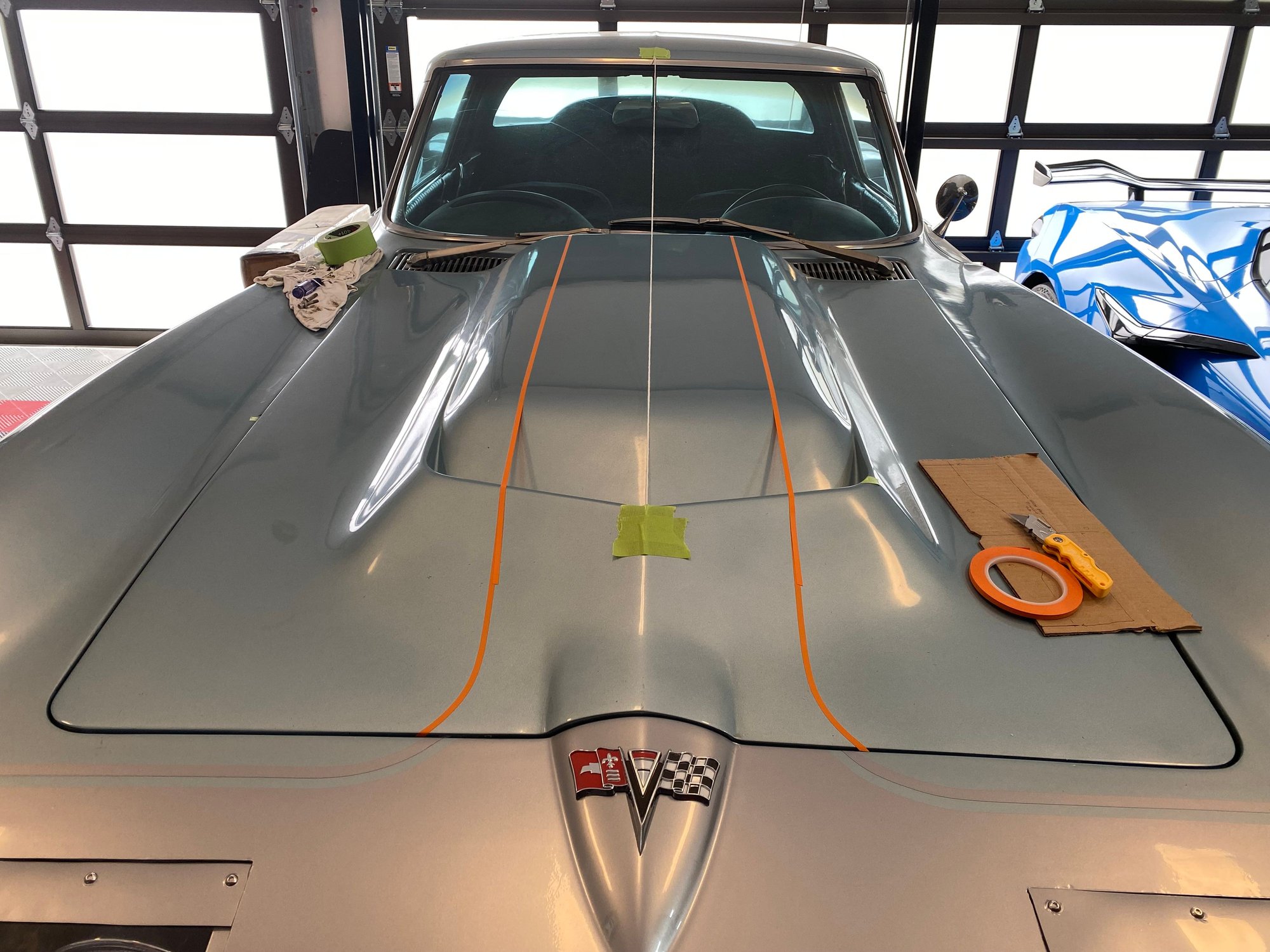 Finding the true centerline on these cars is ridiculous. I’m centering it on the body line even though there is 1/8-1/4” difference when I measure side to side. This worked pretty well. I also made a little cardboard template to ensure the distance between my reference tape stripes are consistent.