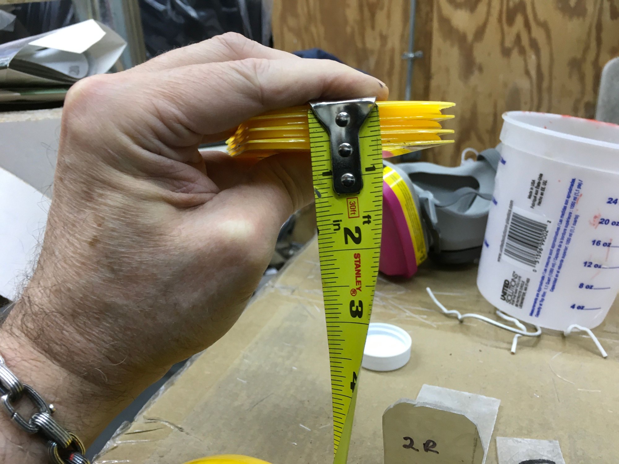 I used a stack of body filler spreaders to determine the proper height