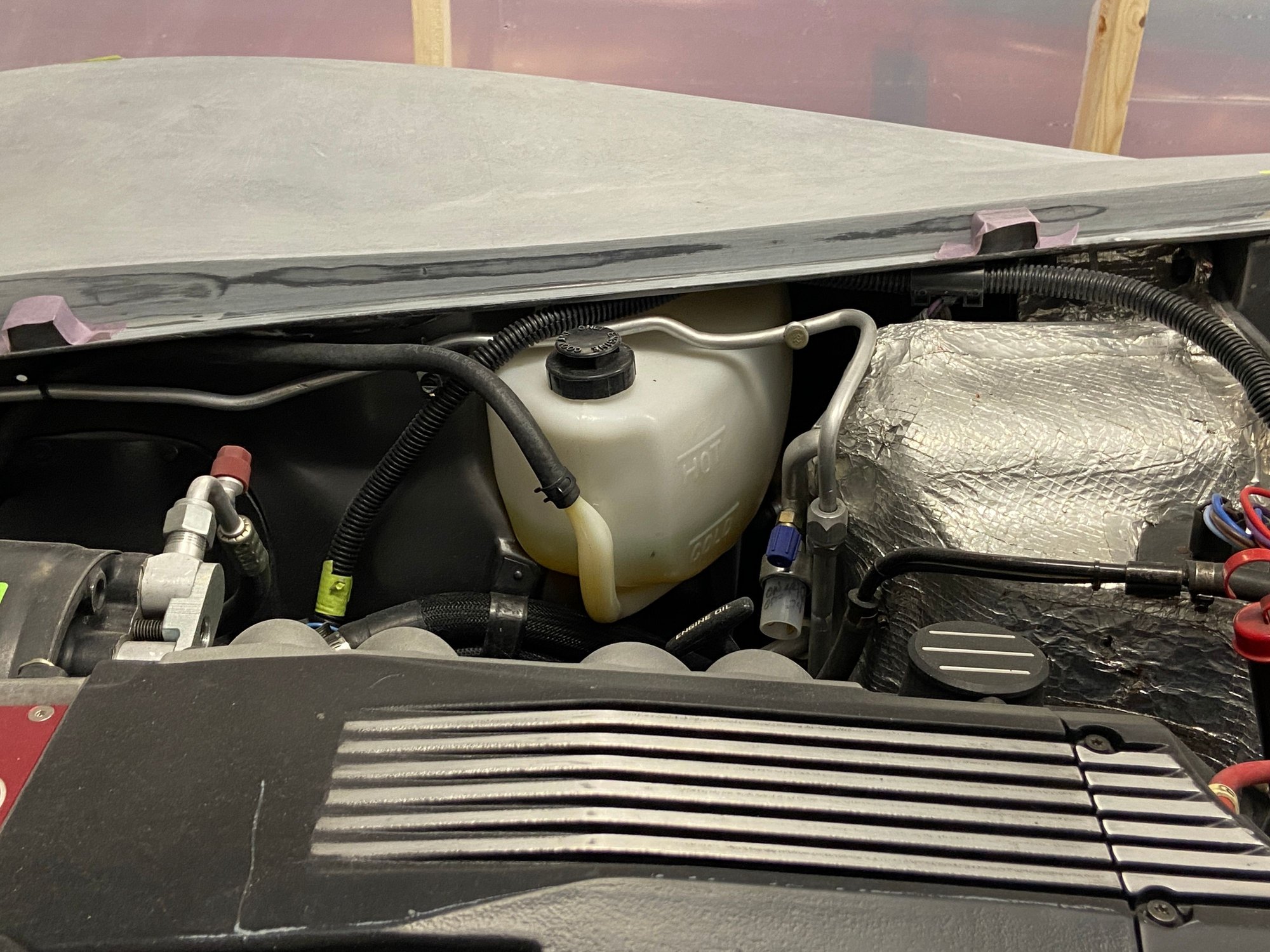 That inner fender is Gunmetal.  But between the splash guards and the shadows, it looks black.