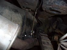 I then turned my thoughts to the exhaust system. The driver’s side pipe had once again sagged down as a few had noted - thanks. Taking lessons lessons from Jim, I added BUBBA hangers at the elbow behind the rear spring. I didn’t want to drill or modify the frame or anything, so used HOARDED JUNK I had laying around to attach the hanger to the frame. I pulled the pipes to within 1/2” of the spring. If this works, I will probably buy the aftermarket hangers to make it look more PRO.