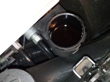 Yikes!!  Just 2K miles on my 2017 M7.  Not a good photo, but level is 2"+ down from top of reservoir, and the color shade of a cigar.   Time to go Ranger/Commando on this one!