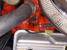 I believe this is the stock tab for the accelerator spring on a 66 300hp / 327. Don't know if it is right for yours.