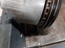 Piston skirts show minimal wear.