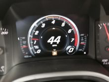 tachometer at 499 miles with warning band.