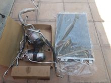 Entire AC system - Compressor $250, Condenser $100