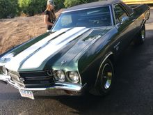At any rate here is a picture of the beast with my 16 year old helper.
The car now has a 496 in it with modern roller cam etc.