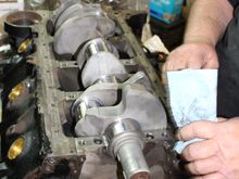 I see two bolt holes on this block near the front of the cam.  If that is where the bolt in roller cam thrust  bearing goes we might already be setup for that.