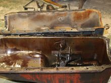 Stock 5 qt BB vette pan is orange in front. Black pan is 1 inch deeper, may be 6 qt.