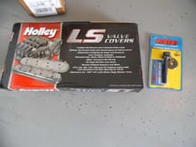 Holley valve covers with an ARP bolt for the underdrive pulley