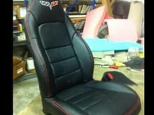 Custom wrapped seats with corvette logo in headrests