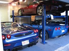 My two Corvettes and my friend's Ferrari F430 Spider.  The Eagle lift is new this year