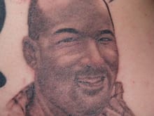 A memorial tattoo of WellAdjusted.