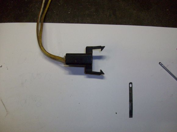 I use a piece of flat metal as a tool
Scrap that I saved from something??? About 1/8" wide and .010" thick.
