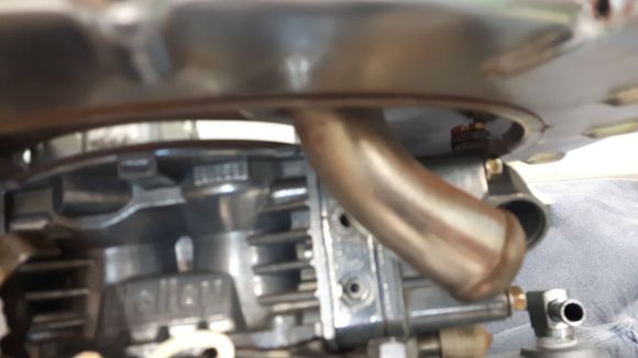 Hitting float adjustment screws.