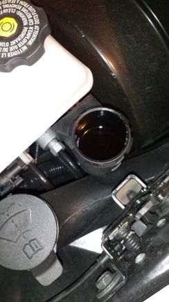 Yikes!!  Just 2K miles on my 2017 M7.  Not a good photo, but level is 2"+ down from top of reservoir, and the color shade of a cigar.   Time to go Ranger/Commando on this one!