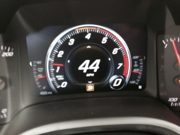 tachometer at 499 miles with warning band.