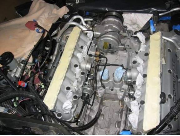 The starter goes at the rear down in the V of the block,with everything bolted on top of it. It 