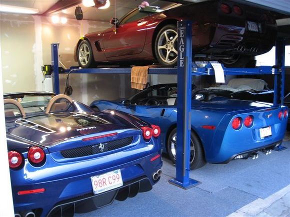 My two Corvettes and my friend's Ferrari F430 Spider.  The Eagle lift is new this year