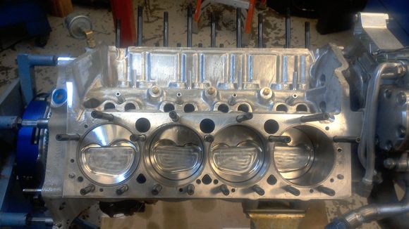 Piston Rods back in. Had to remove one Stud for each Cylinder to allow Ring Compressor to fit in there.