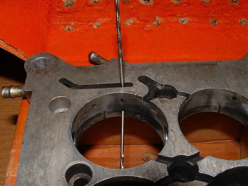 converting tri power carb ported port to manifold vacuum