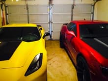 This is my vette and my Hubby's Camaro side by side in the garage.