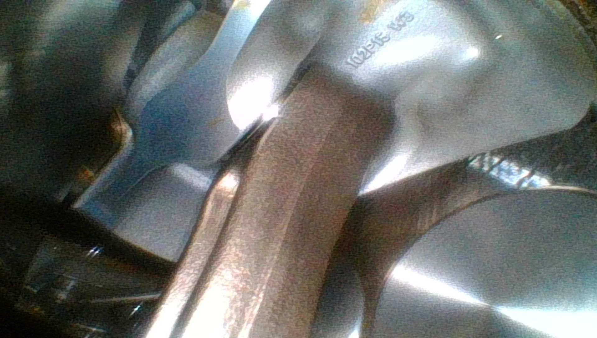 View of the underside of the piston.  