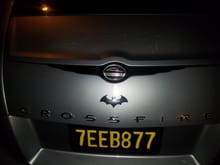 Batman 3d silver logo.