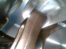 View of the underside of the piston.  