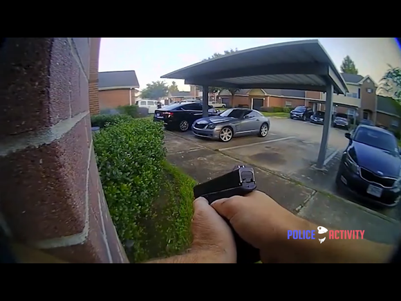 A civilian in the house was fatally wounded by Houston Police, Crossfire A Ok.(screenshot from YouTube video)