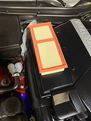 OEM filter on top of the larger air filter chamber.  The difference is dramatic.  I had already installed the new filter and didnt want to take it out for comparison, but you get the idea.